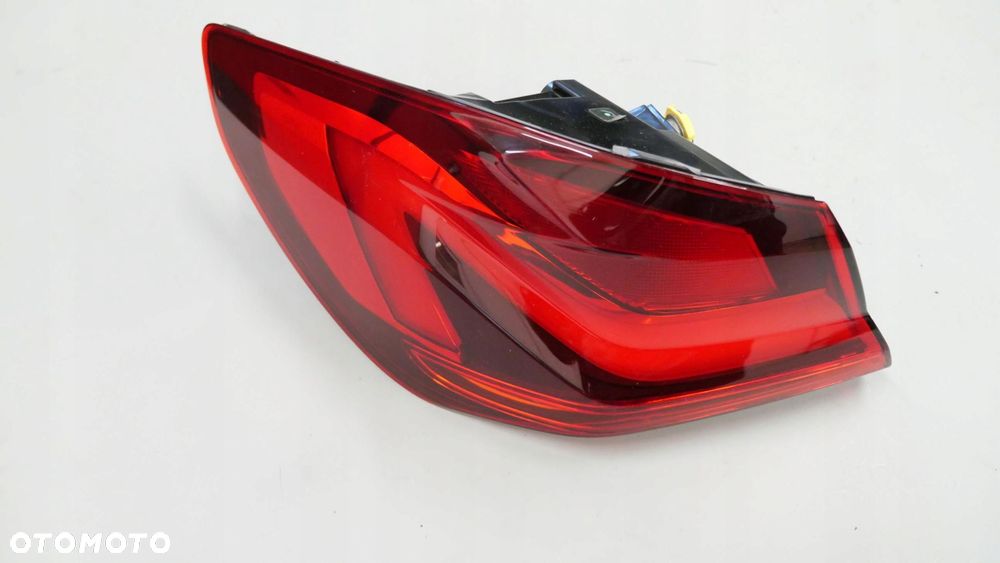 bmw f40 lampa lewy tył lewa tylna w błotnik 7450643 - 1
