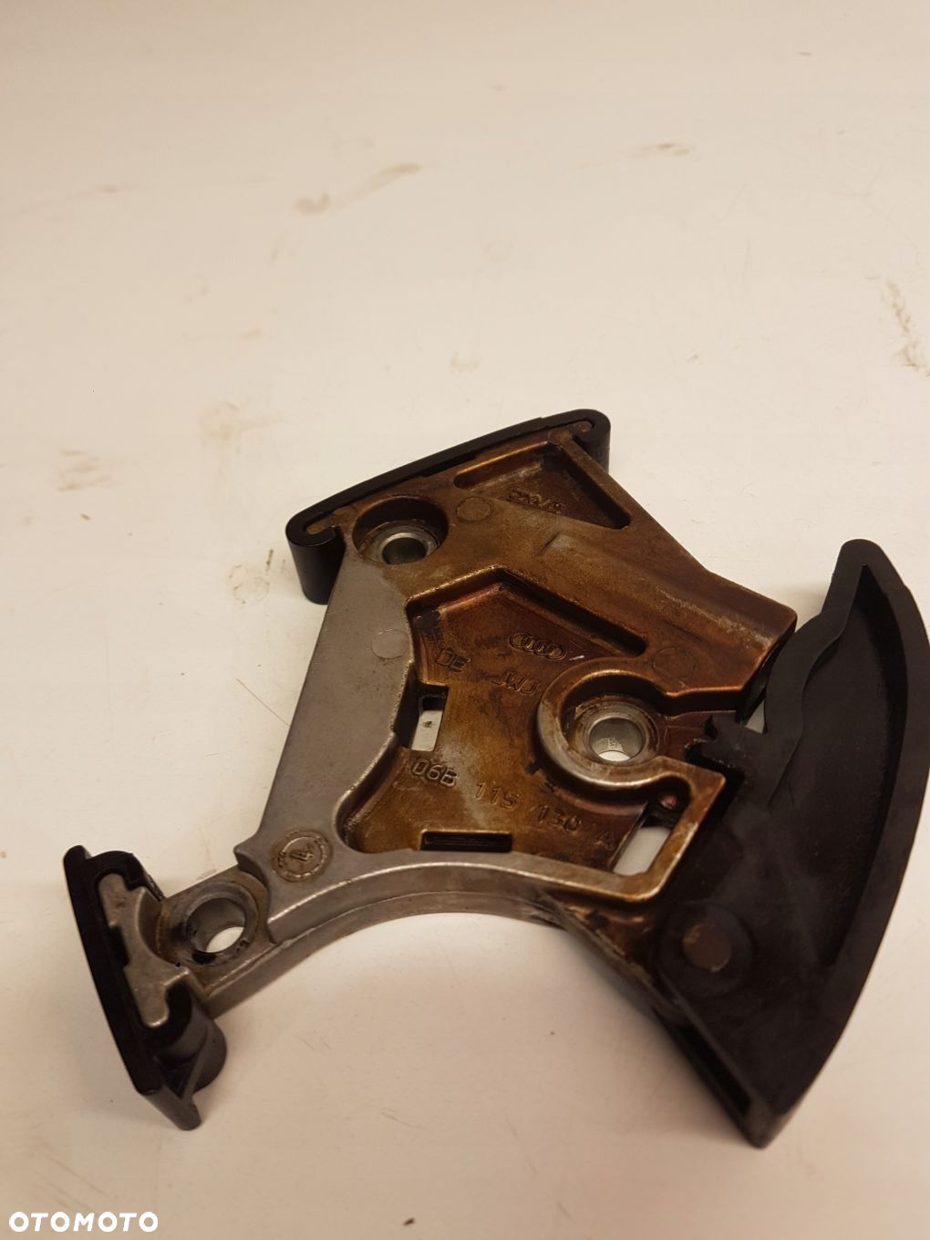 NAPINACZ ŁAŃCUCHA ROZRZĄDU AUDI 2.0 TFSI 06B115130 - 2