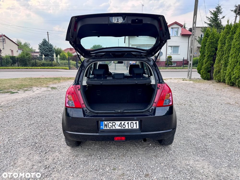 Suzuki Swift 1.3 Club - 9