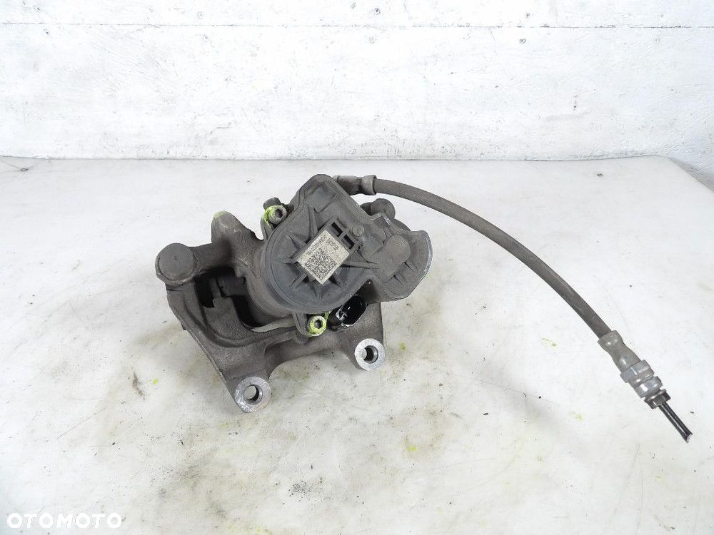 SKODA SUPERB IV 4 2.0TSI ZACISK HAMULCOWY TYŁ PRAWY - 2