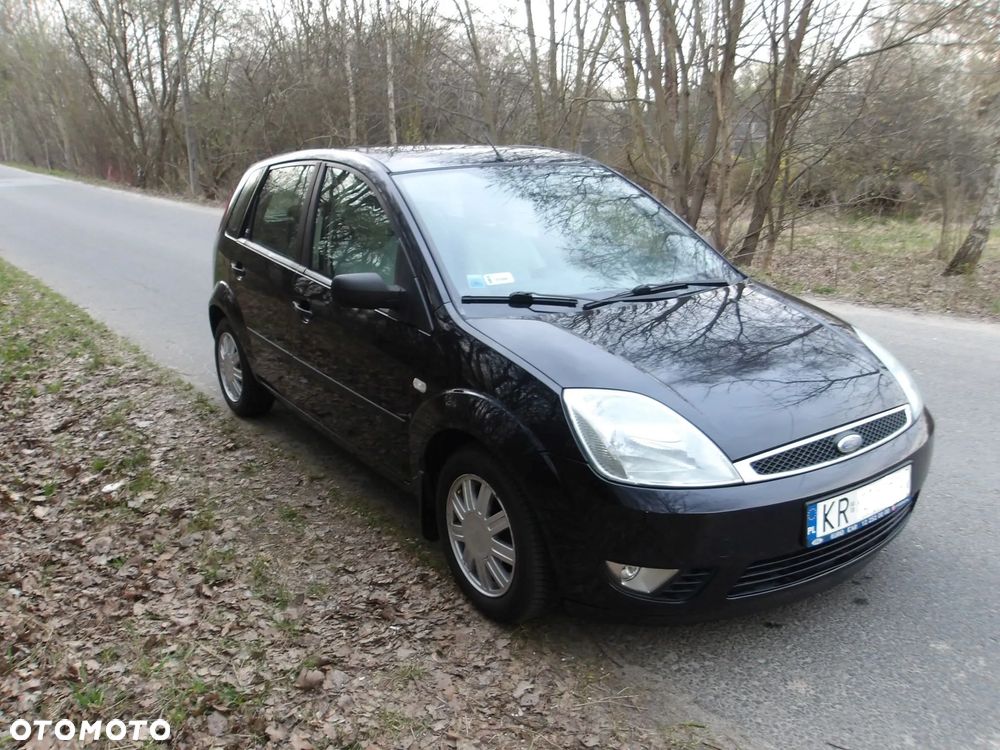 Ford Fiesta 1.4 Ghia - 10