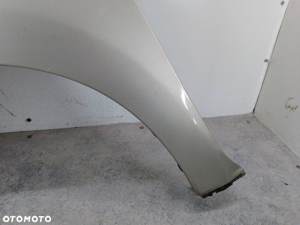 BŁOTNIK LEWY PRZÓD NISSAN TIIDA K32 - 7