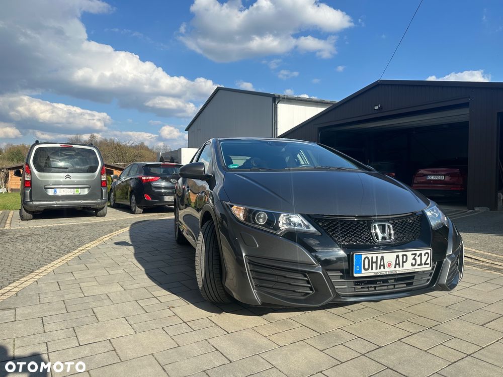 Honda Civic 1.4 i-VTEC Elegance - 1