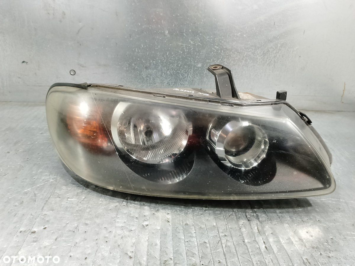 LAMPA PRZÓD PRAWA NISSAN ALMERA N16 H235GR-LE 100-16391 - 1