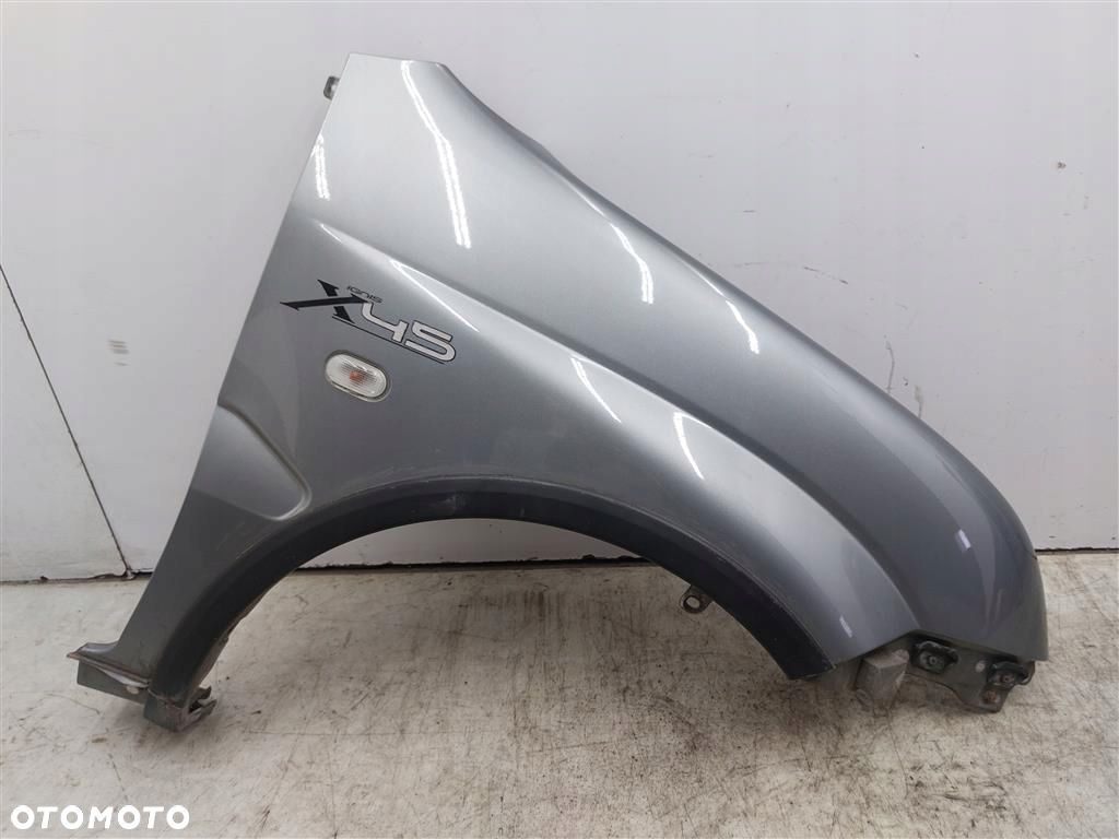 Błotnik przedni prawy Suzuki Ignis 2000-2010 LAK:ZCD - 1