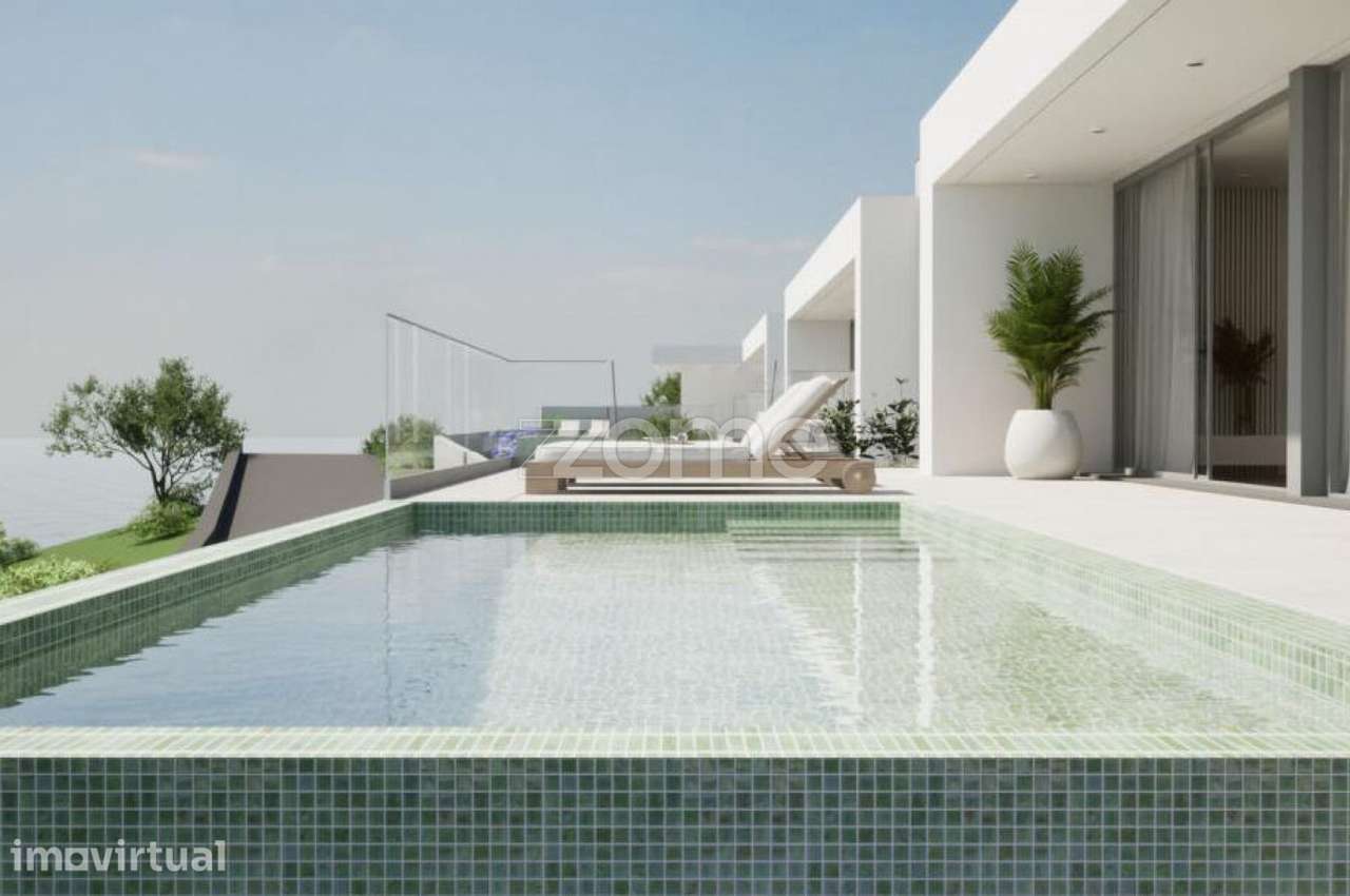 Moradia T3 Nova Tipo Geminada com piscina,H2 Arco da Calheta