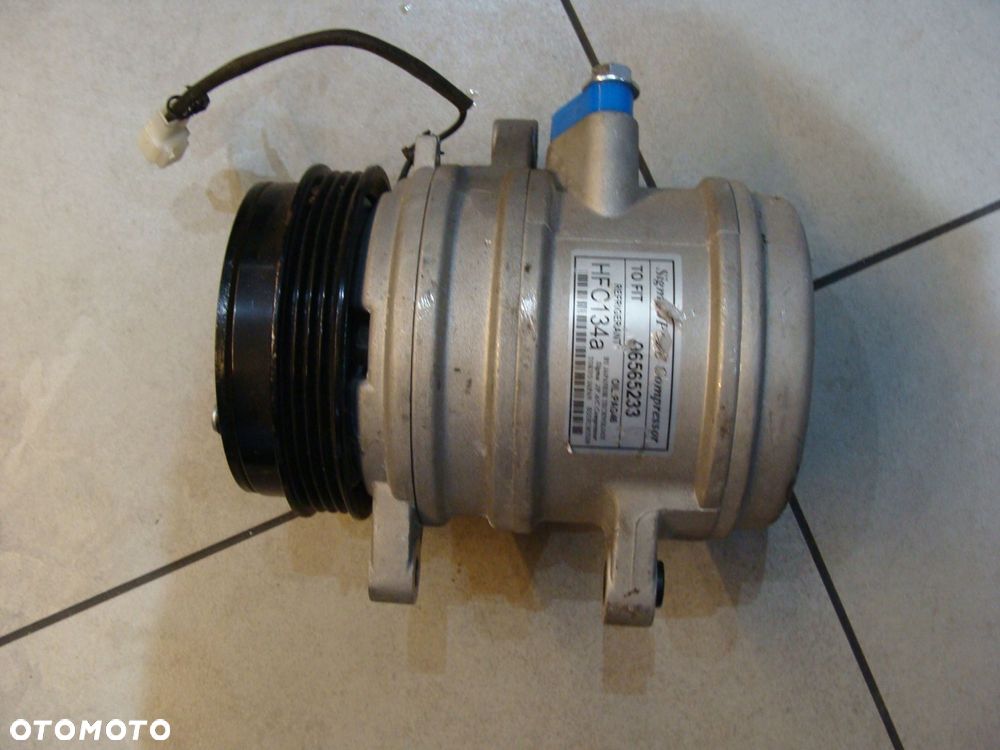 sprężarka klimatyzacji nowa 96565233 - 1