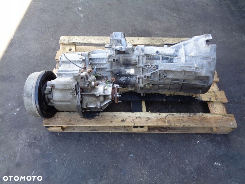 Skrzynia BIEGÓW Reduktor Land Rover Defender 2.4 Tdci 7U3R7003AD - 1