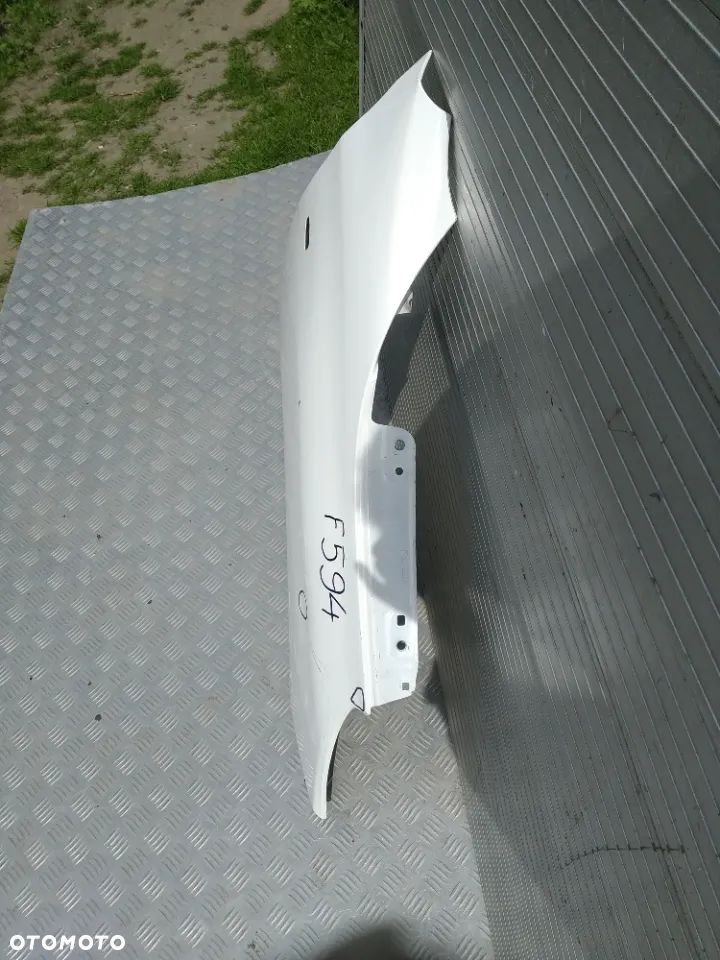 F594 PRAWY BŁOTNIK TOYOTA HILUX 2016- - 2