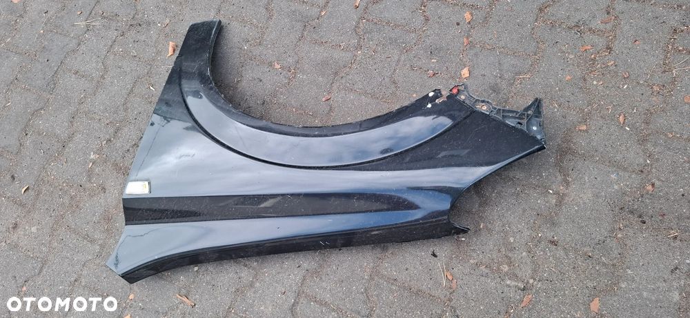 Blotnik lewy opel Astra H