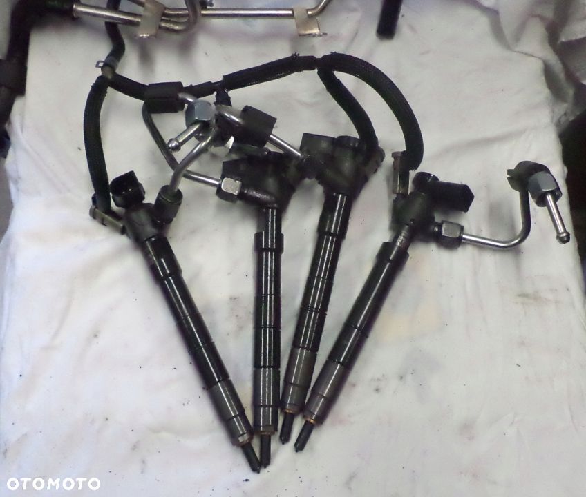 Wtrysk wtryskiwacz  AUDI VW 2.0 TDI 04L130277AS - 1