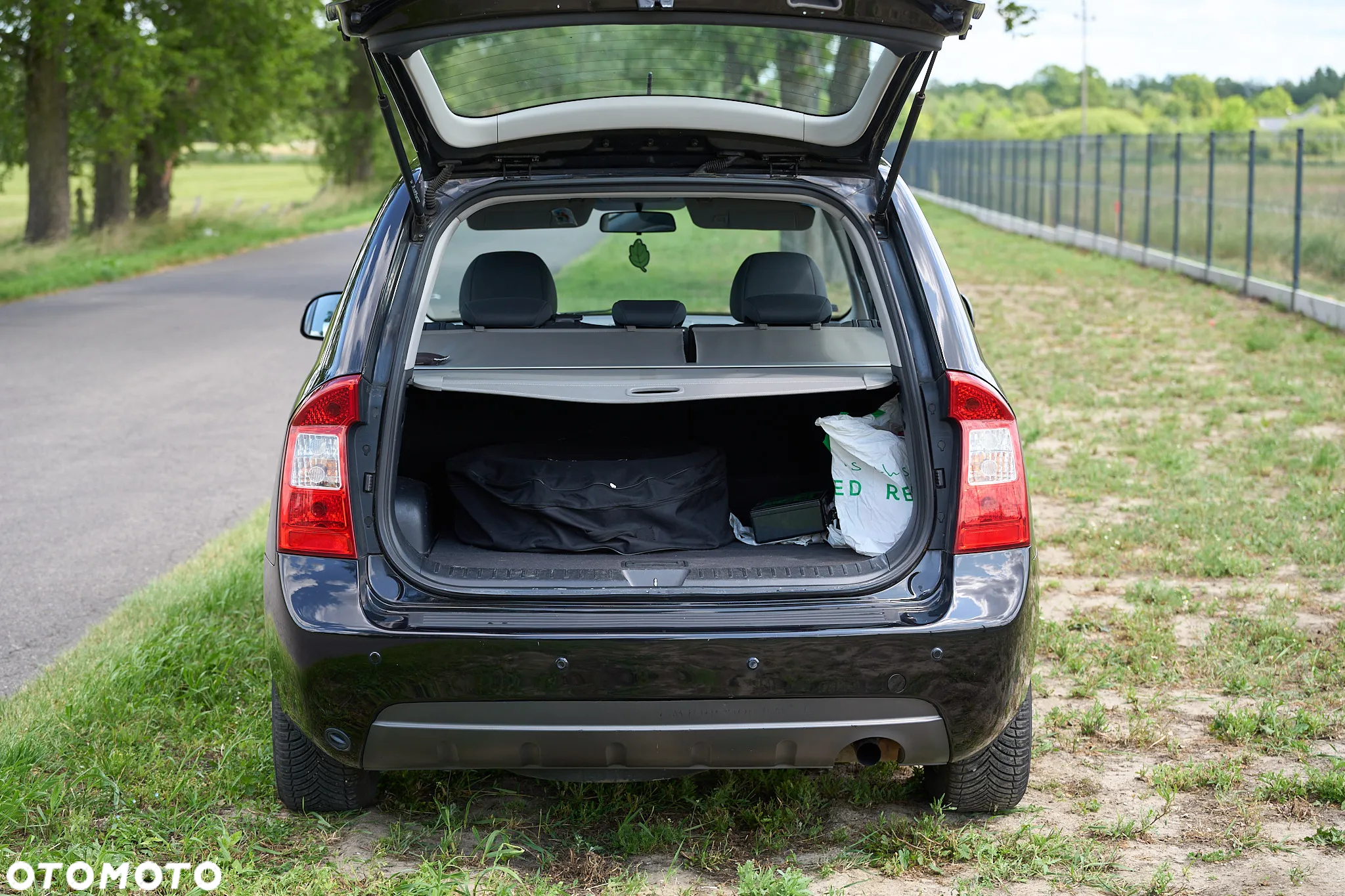 Kia Carens - 13