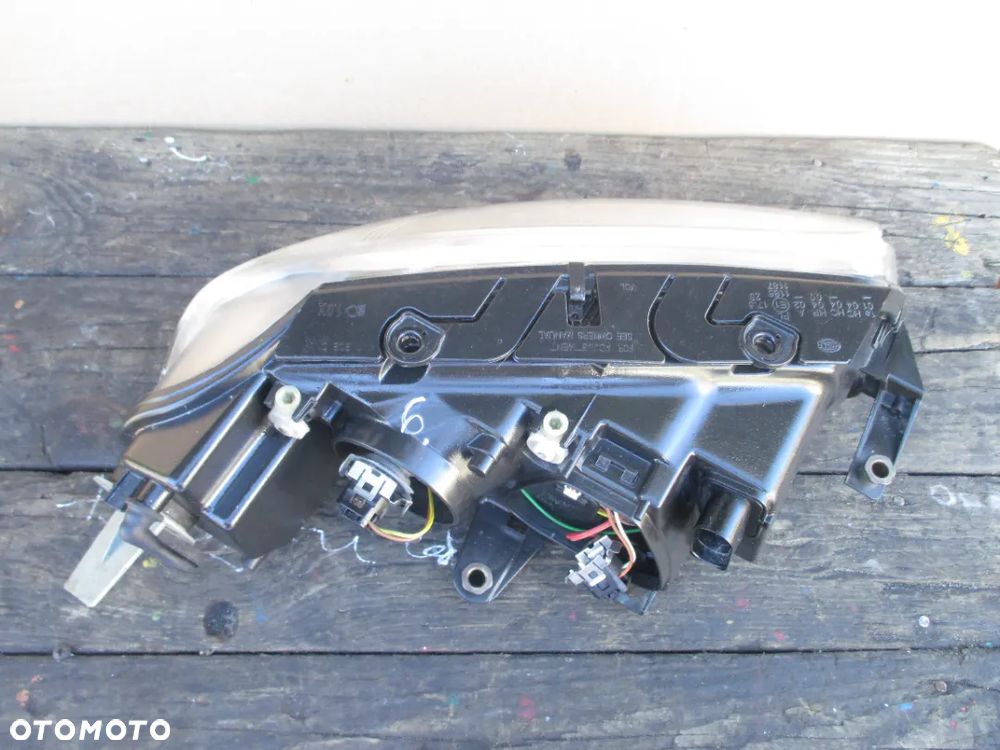 Lampa lewa PASSAT B5 LIFT HELLA EUROPA - 7