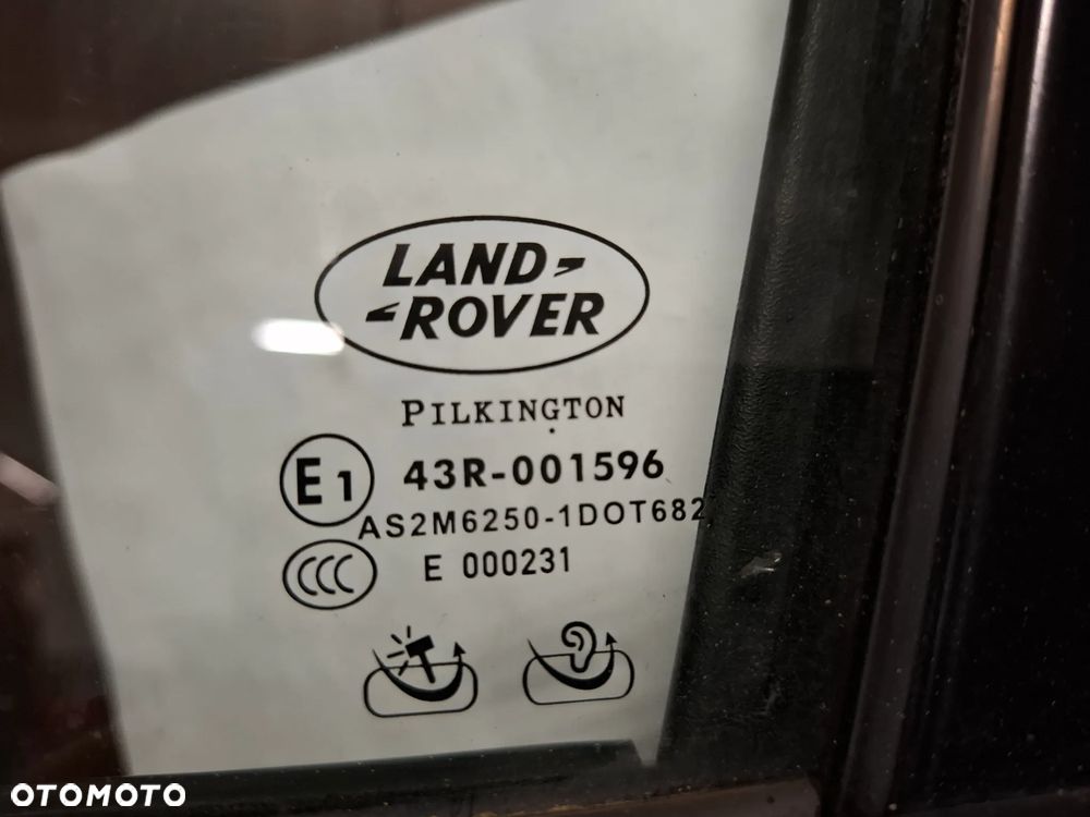 Drzwi lewy przód Land Rover Range Rover Sport rok 2010 lift 5,0 V8 510 KM kolor granatowy metalik - 2