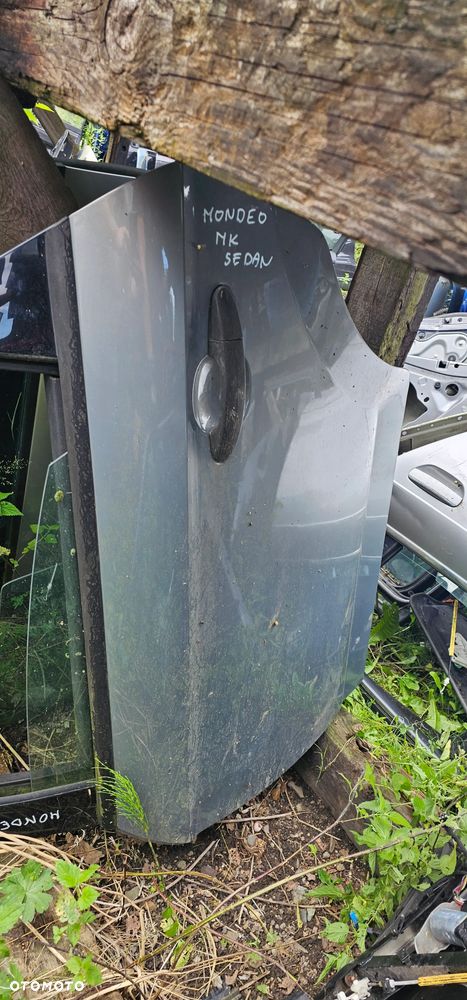 Drzwi tylne tył lewe Ford Mondeo Mk4 sedan - 1