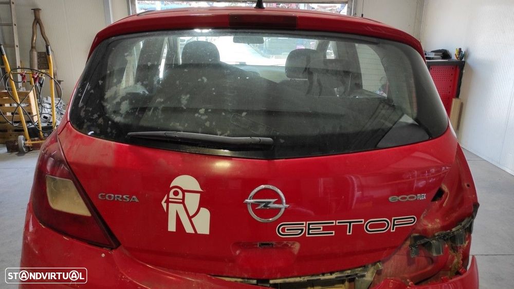 MALA TRASEIRA OPEL CORSA D CMON - 1