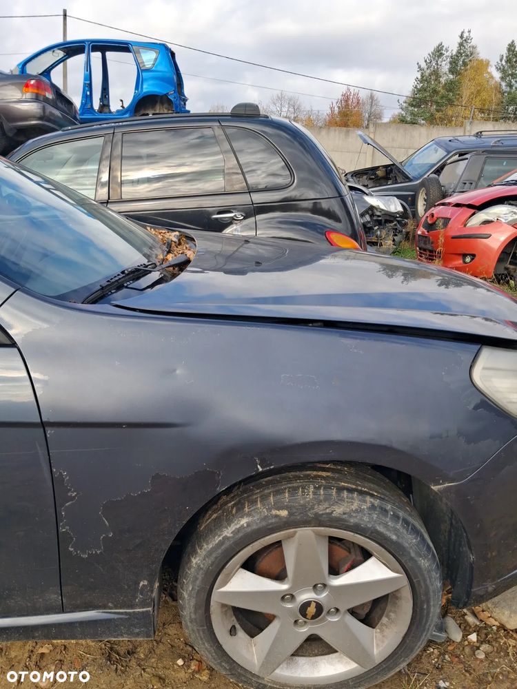 Chevrolet Epica blotnik prawy 88U - 4