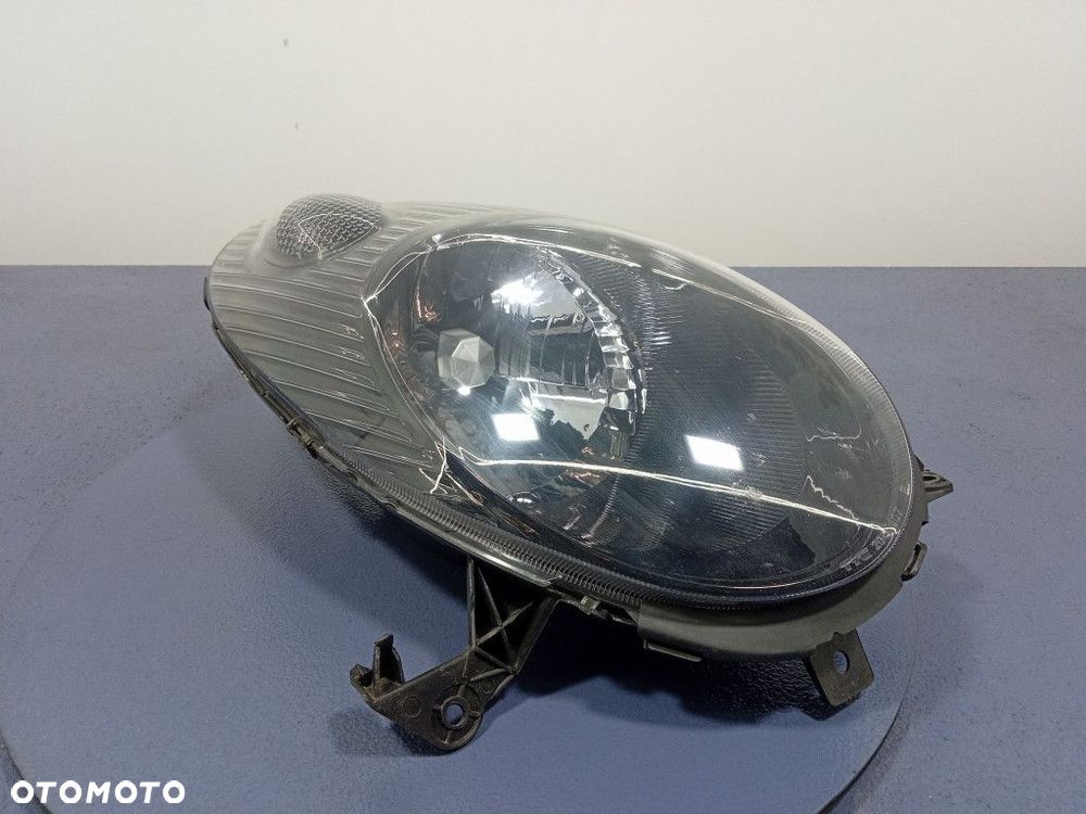 NISSAN MICRA III K12 REFLEKTOR PRAWY LAMPA H4 EU 20-A307 - 1