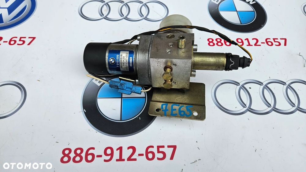 BMW 7 E65 E66 POMPA HYDRAULICZNA DOMYKANIA KLAPY TYŁ BAGAŻNIKA SIŁOWNIK SIŁOWNIKI KLAPY POMPKA 7015009 - 1