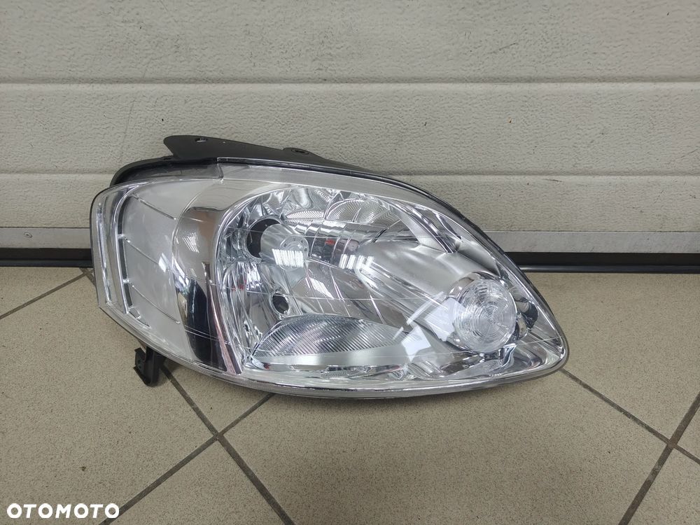 VW Fox prawy REFLEKTOR EUROPA - 1
