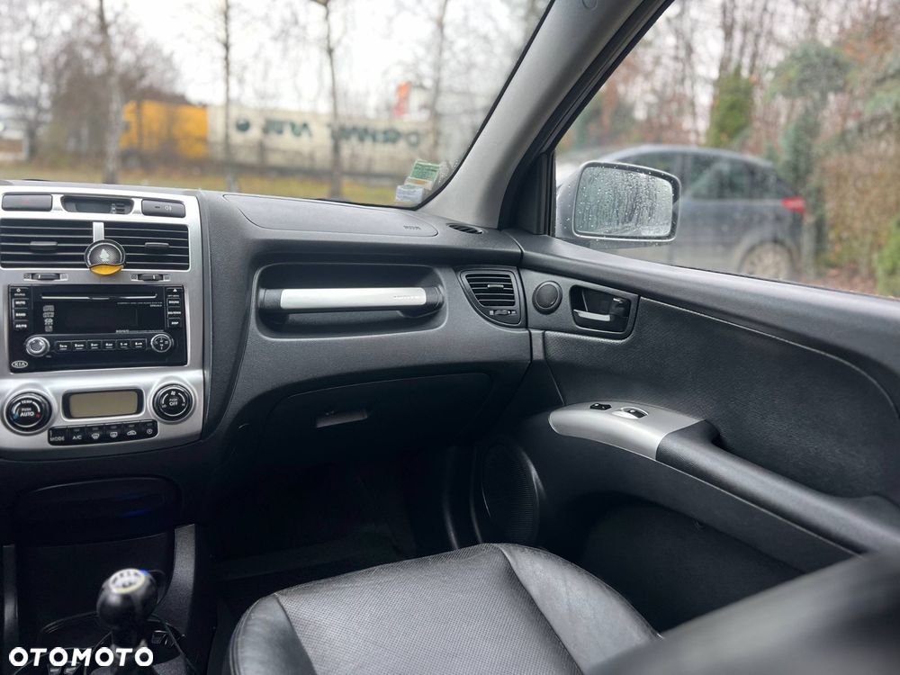 Kia Sportage 2.0 CRDI EX - 13