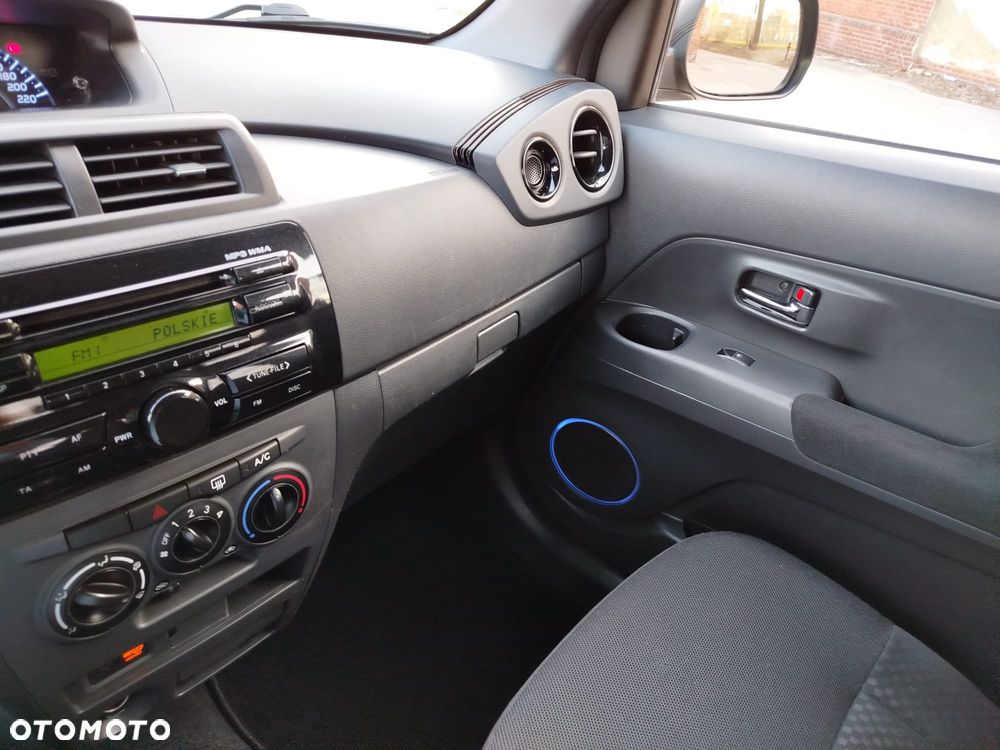 Daihatsu Materia 1.5 - 12
