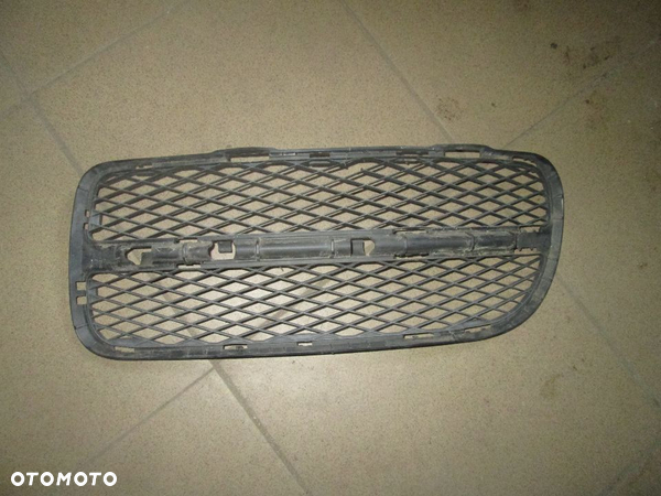 Atrapa kratka zderzaka lewa Volkswagen Toaureg 7L 05r.