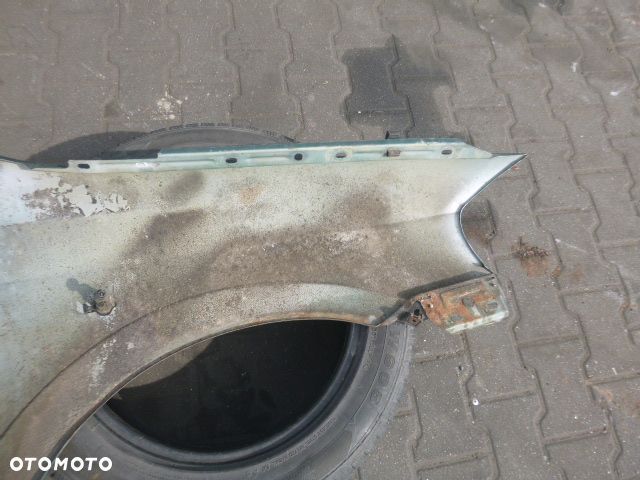 BŁOTNIK LEWY PRZÓD LEWY PRZEDNI OPEL ASTRA II G Z374 - 13