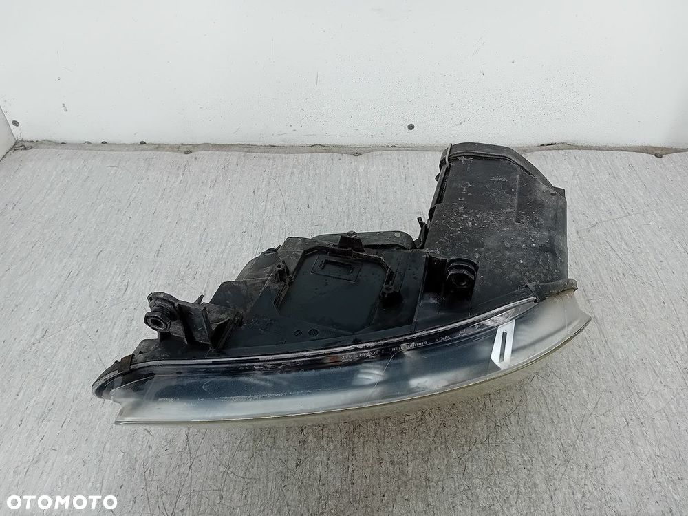 LAMPA PRZÓD PRAWA VW TOURAN I 1T0941006 031205202 - 2