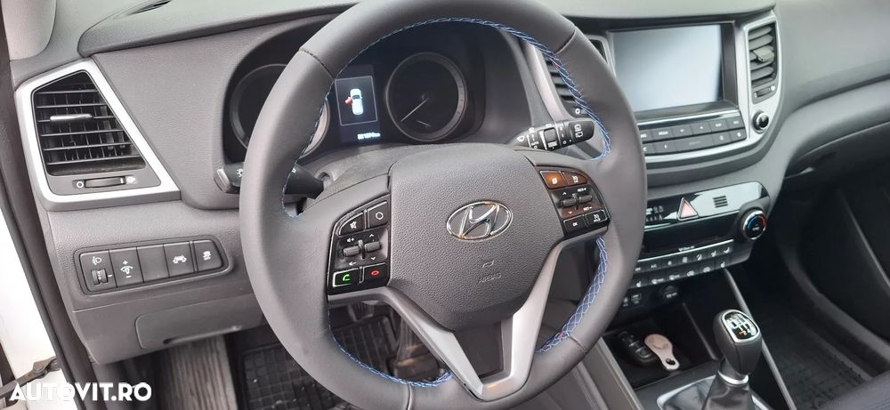 Hyundai Tucson blue 1.7 CRDi 2WD Intro Edition - 12