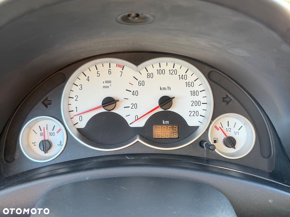 Opel Corsa 1.2 16V Enjoy - 6