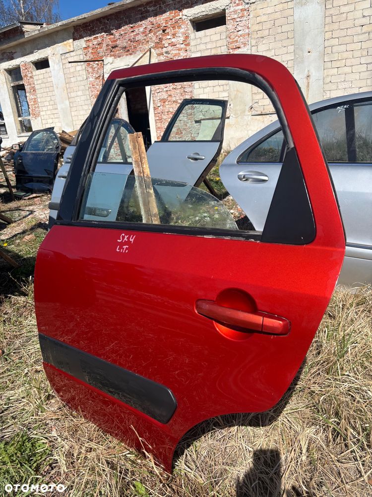 Drzwi lewy tył Suzuki Sx4