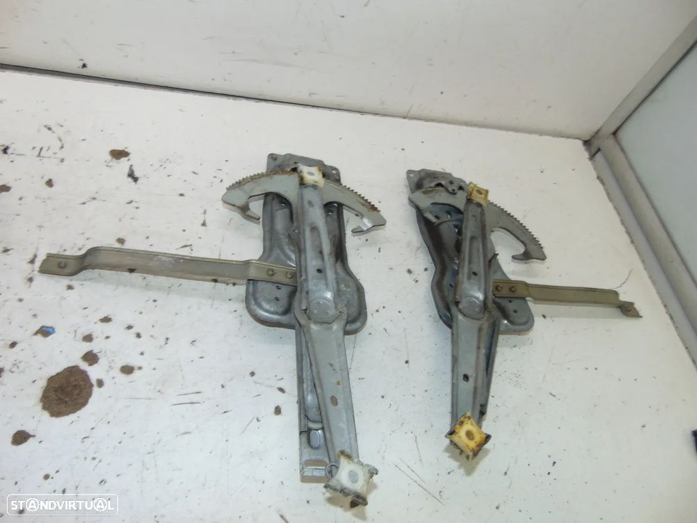 BMW E34 elevadores - 6