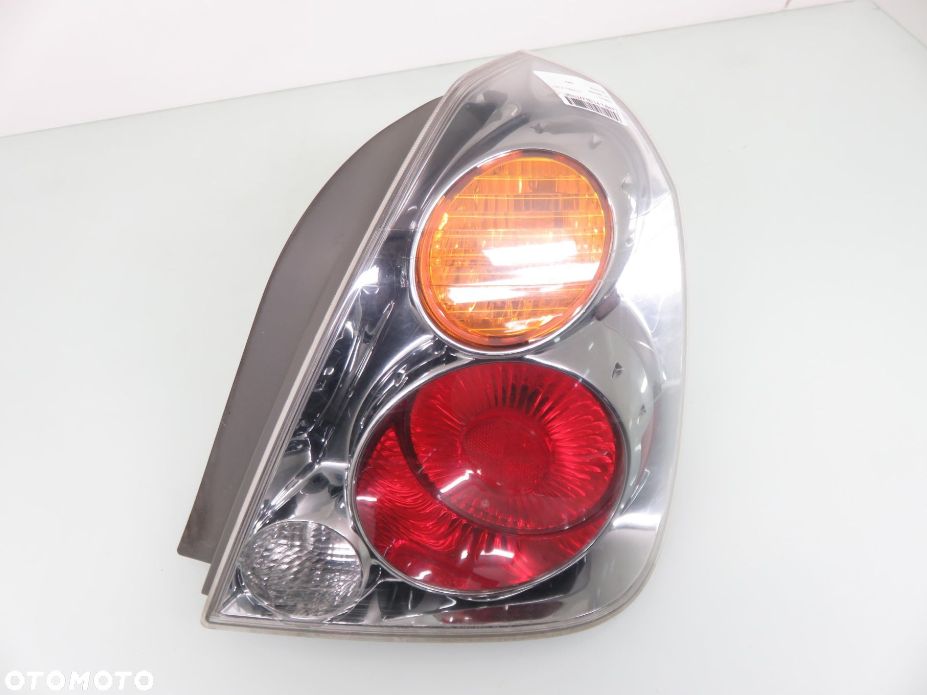 LAMPA PRAWA TYLNA NISSAN ALTIMA L31 935300 - 1