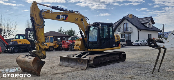 Caterpillar CAT 311D/ Maszyna sprowadzona/