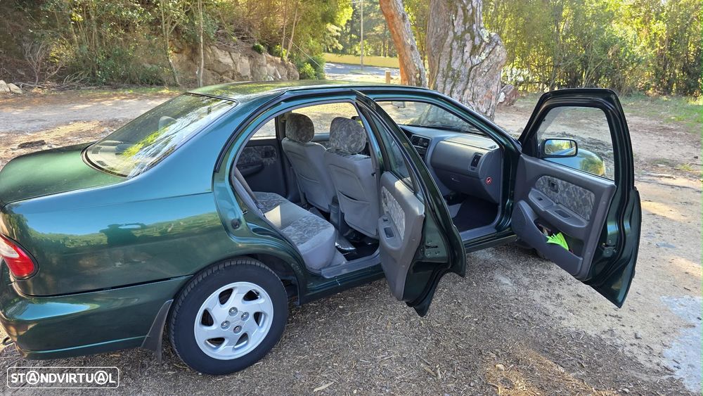 Nissan Almera 1.4 SLX - 11