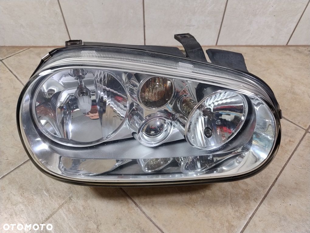 Volkswagen Golf 4 IV lampa reflektor prawy przód hella Europa wysyłka - 1