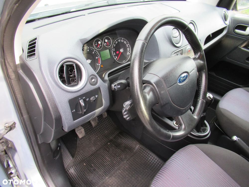 Ford Fusion 1.4 + - 15