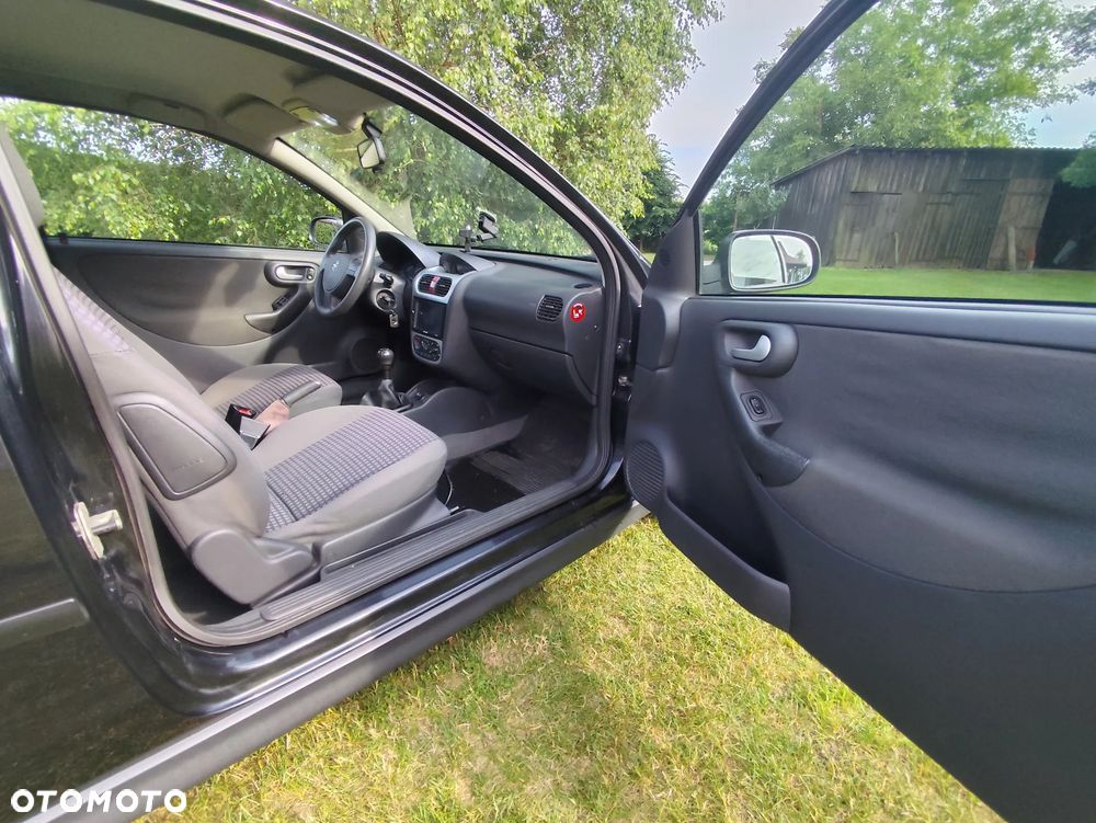 Opel Corsa 1.2 16V Cosmo - 9