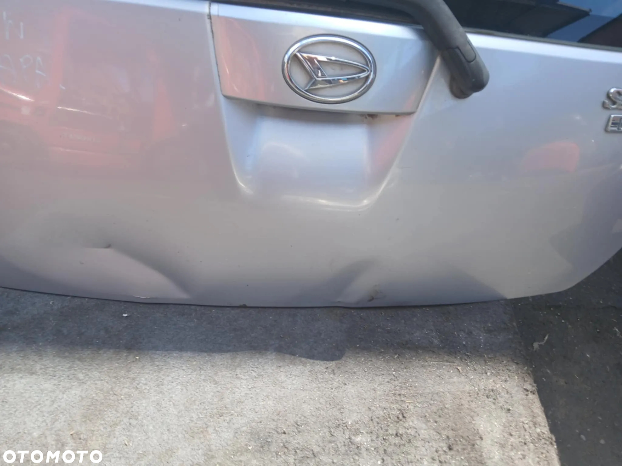 Daihatsu Sirion Klapa bagażnika kod lakieru 28USD - 2