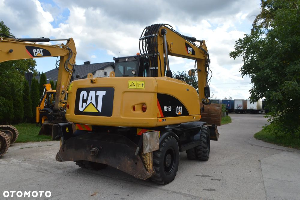 Caterpillar CAT M315D *2011* IDEALNY!!! - 7