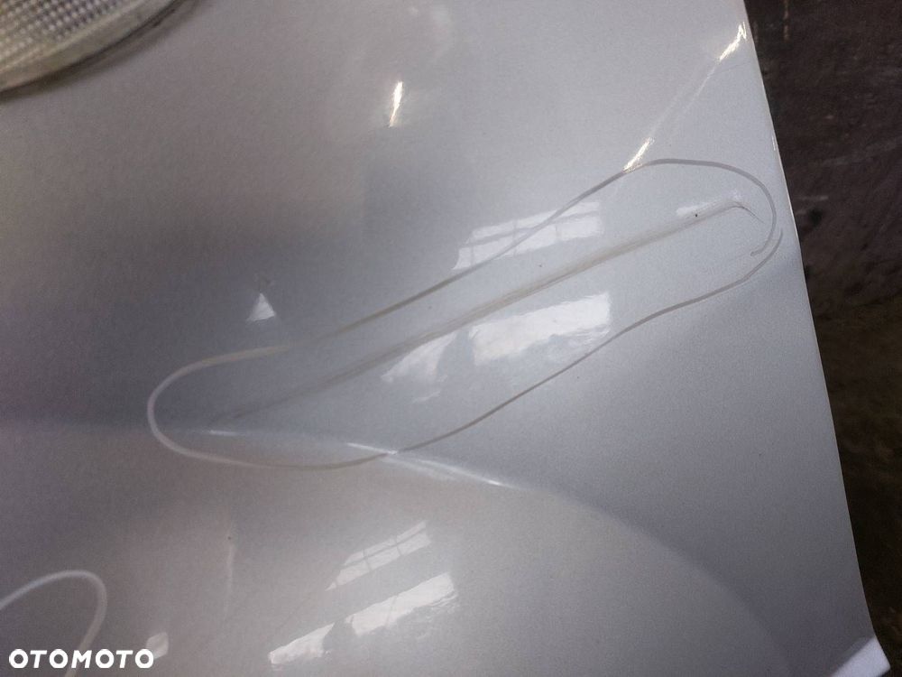 BŁOTNIK LEWY PRZÓD DAEWOO NUBIRA II J200 92U - 4