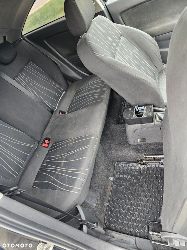 Opel Corsa 1.2 16V Cosmo - 10