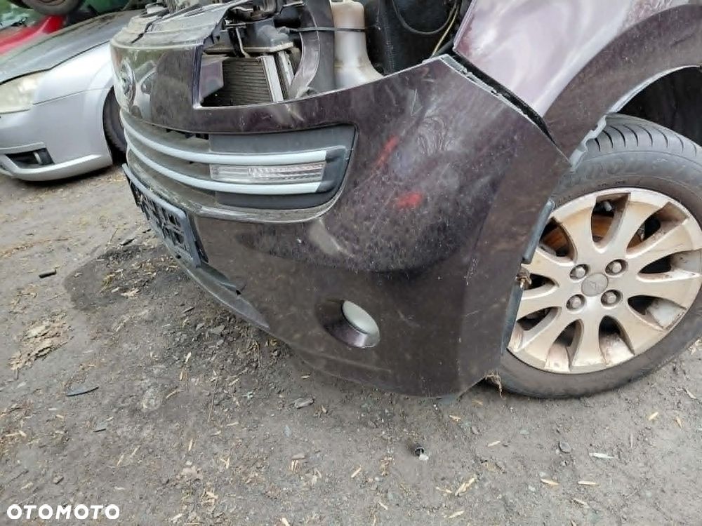Zderzak przedni zderzak przód Daihatsu Materia Rok 2008 Pojemność 1298 Moc 67 kw Benzyna - 5