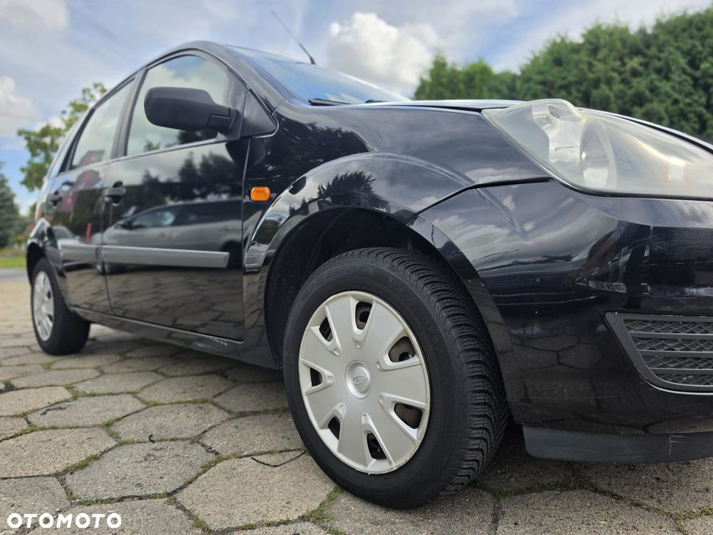 Ford Fiesta 1.4 Ghia - 37