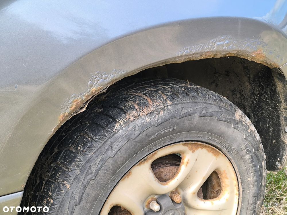 Suzuki Grand Vitara 1.6 - 13