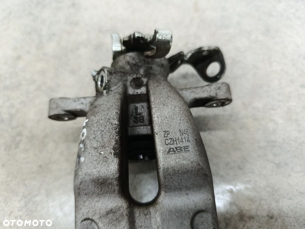 ZACISK HAMULCOWY LEWY TYŁ OPEL ASTRA H CZH1414 ABE 1.9 CDTI - 2