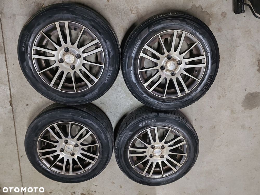 felgi aluminiowe 14 4x100 et35 toyota yaris i 99-05 - 1