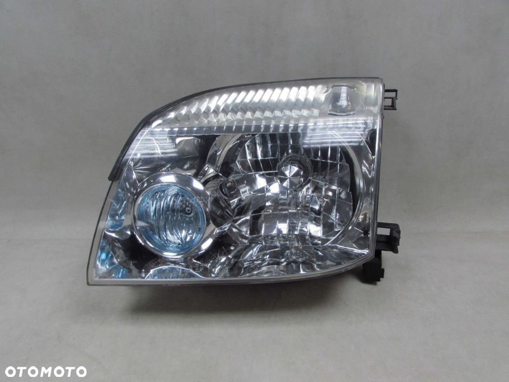 NISSAN X-TRAIL T30 LIFT 04-07 LAMPA PRZOD LEWA REFLEKTOR XENON UK - 1