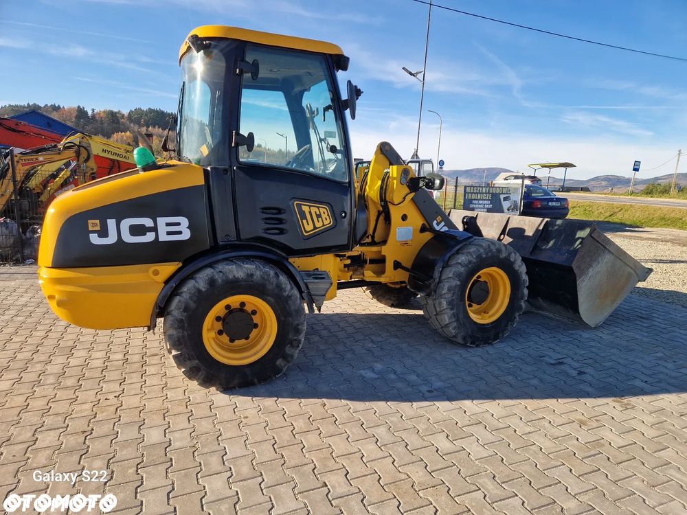 JCB 406 - 9